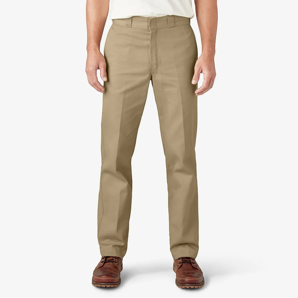 City Of Saints Clothing beige Dickies Original 874 work pants on a man wearing brown leather boots.