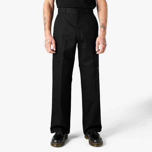 City Of Saints Clothing Dickies loose fit black work pants with reinforced double-knee panels worn by a model.