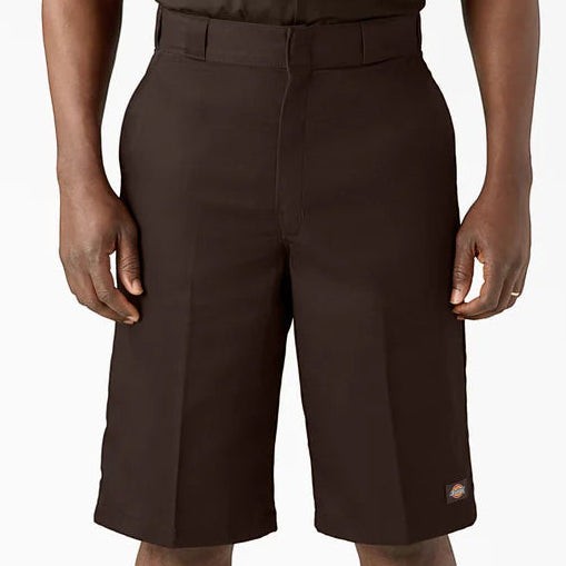 City Of Saints Clothing brown loose fit flat front work shorts with a 13-inch inseam and durable wrinkle-resistant fabric.